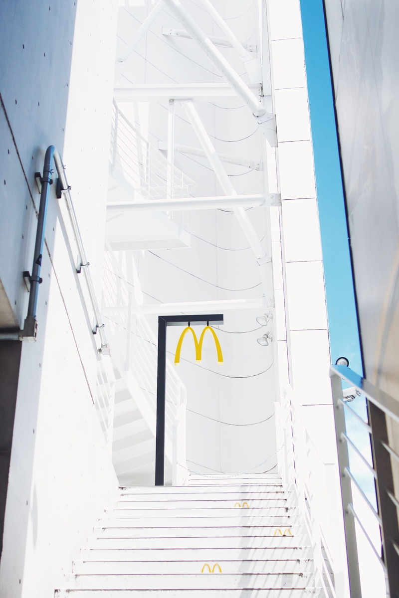 staircase, architecture, white color, building, mcdonald, sign, signage, direction, day, transportation, the way forward, railing, 2K, nature, steps and staircases