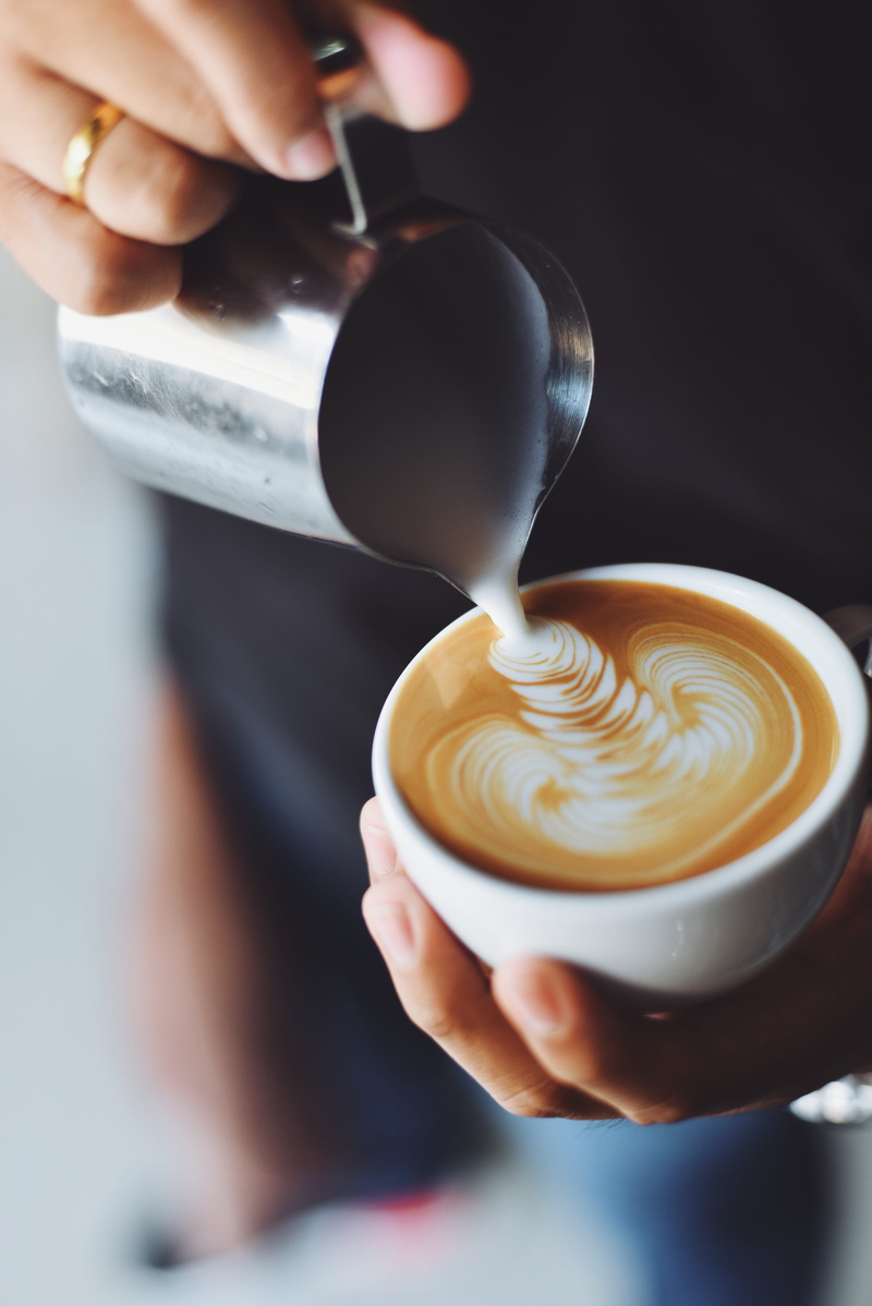 froth art, coffee - drink, real people, unrecognizable person, hot drink, cream, cappuccino, 5K, milk, indoors, coffee, frothy drink, hands, hand, human hand