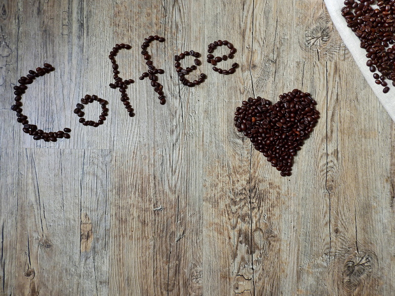 positive emotion, communication, directly above, food, roasting, wood - material, design, coffee, no people, text, bean, freshness, heart shape, beverages