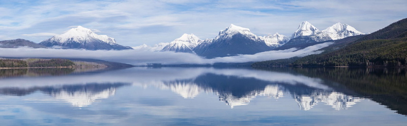 peaks, beauty in nature, mountain peak, lake mcdonald, sky, outdoors, tranquility, reflection lake, alpine, snow, no people, snowcapped mountain, clouds
