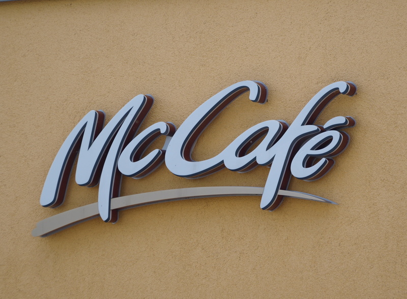 indoors, communication, single object, letter, neon sign, wall - building feature, mccafe, number, built structure, still life, love, emotion, mcdonalds