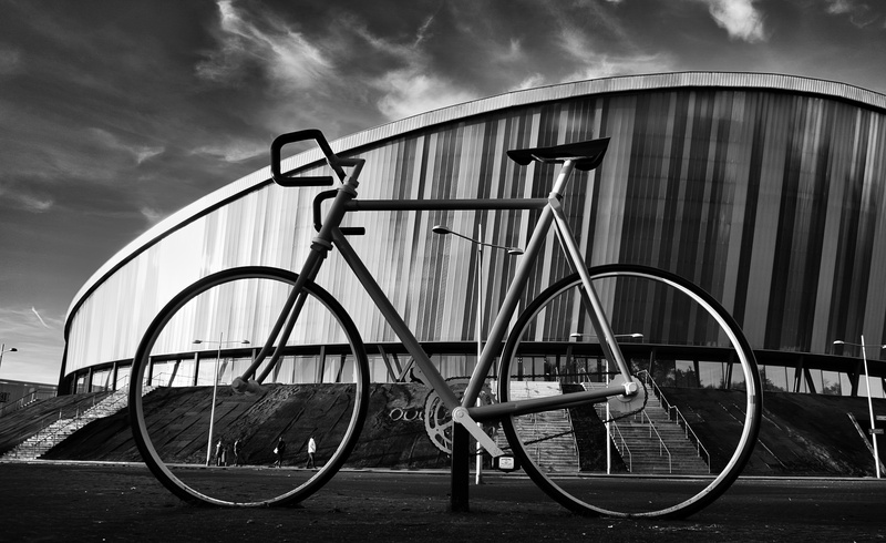 tarmac, bicycle, person, architecture, stationary, car, sky, automobile, building exterior, handrail, photography, sports car, bike, vehicle, metal, railing