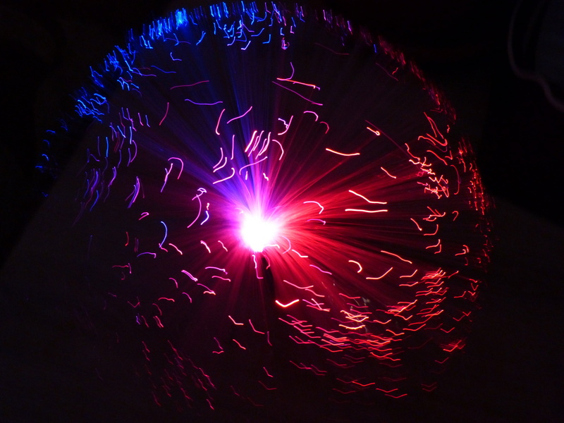 black background, ufolampe, pink, heat - temperature, lighting, indoors, 4K, nature, light - natural phenomenon, technology, light, close-up, illuminated
