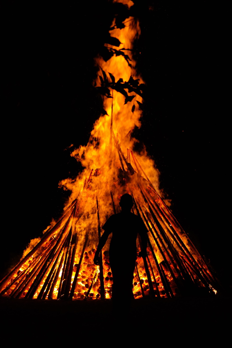 red, go, silhouette, sun, witches hump, real people, fire - natural phenomenon, dark, reichenbach, burning, motion, standing, rear view, burn, customs