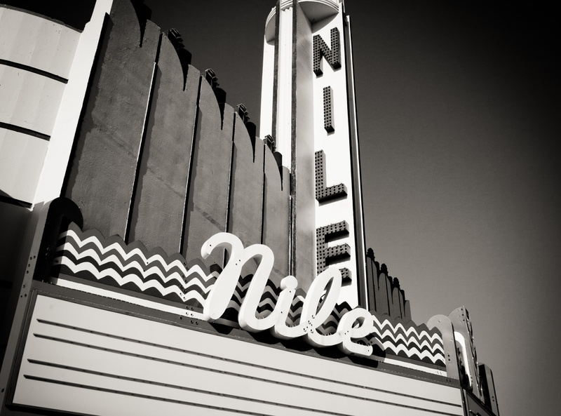 arts culture and entertainment, Bakersfield, tears, kern county, crocodile, building, sky, low angle view, day, nile, western script, railing, in a row