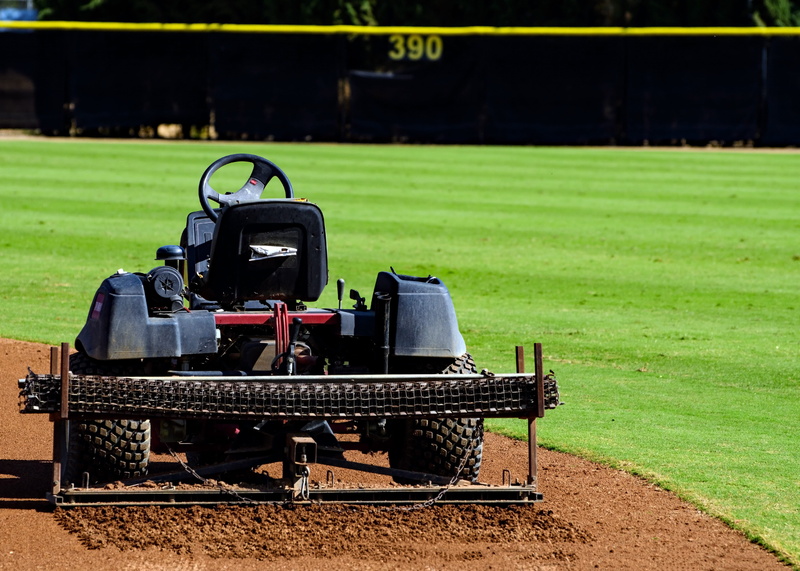 no people, kern county, equipment, bakersfield, sunlight, green color, csub, machinery, focus on foreground, hardt field, nature, growth, metal, competition