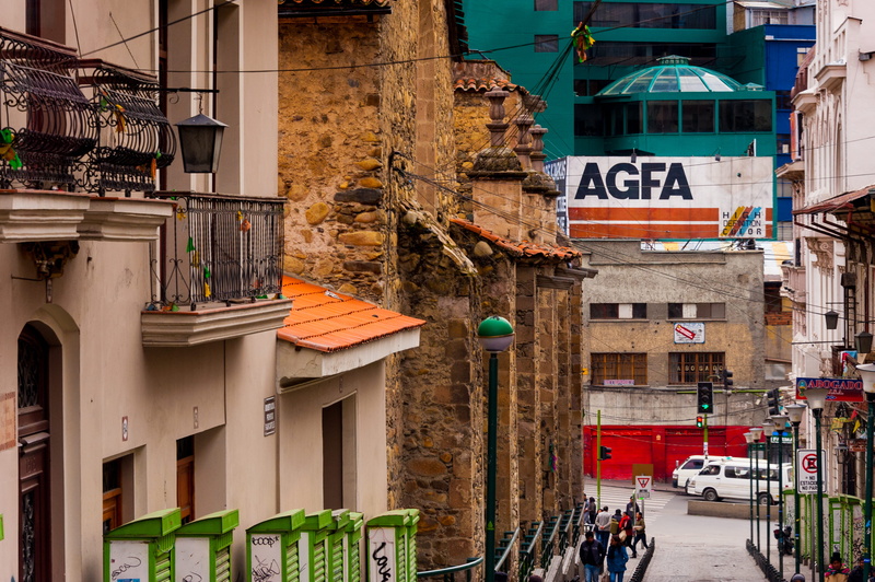 road sign, text, agfa, travel, window, la paz, building, incidental people, street, nikon, day, d700, outdoors, motor vehicle, building exterior, residential district