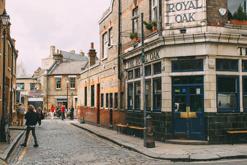 footpath, shops, men, outdoors, walking, street, architecture, 4K, residential district, london, full length, window, building, real people, the royal oak