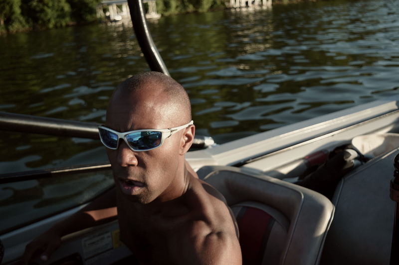 one person, mature men, water ski, water front, lifestyles, fashion, lake day, sunglasses, wakeboard, nautical vessel, motor boat, transportation, outdoors