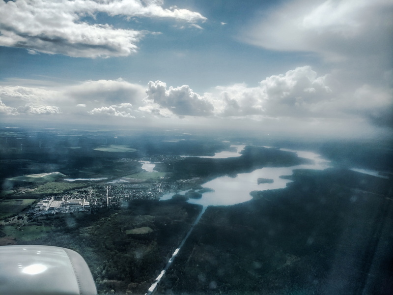 city, water, airplane, no people, day, beauty in nature, mecklenburg-vorpommern, lake, nature, building exterior, sea, landscape, flight, aerial view, sky