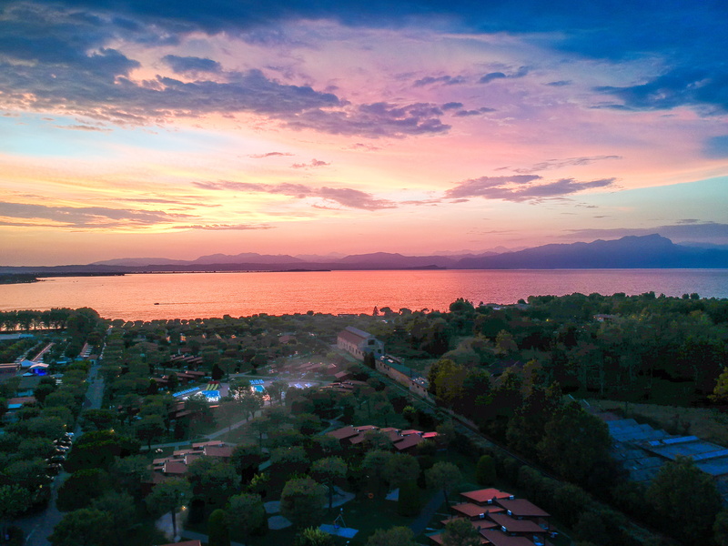 horizon over water, building, nature, sea, built structure, sunset, garda, bay, high angle view, italy, city, sky, scenics - nature, water, building exterior