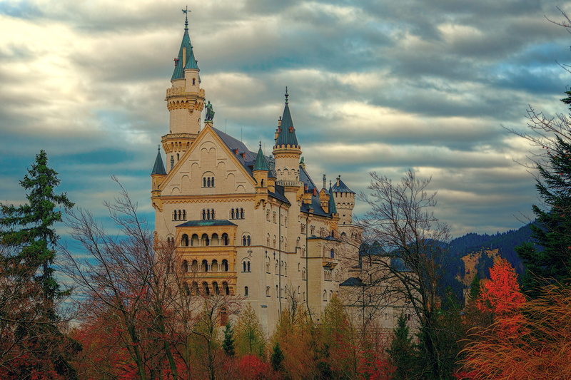 place of worship, outdoors, cloudy, alp, day, turret, plant, cloud - sky, fairytale, sky, built structure, building exterior, castle, no people, belief
