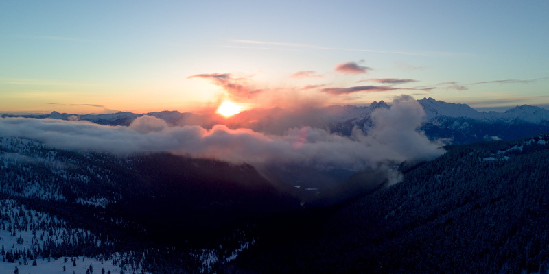 sky, mountain, beauty, beauty in nature, fog, environment, coniferous tree, drone, whistler, tranquil scene, mountain peak, mountain range, cloud, idyllic