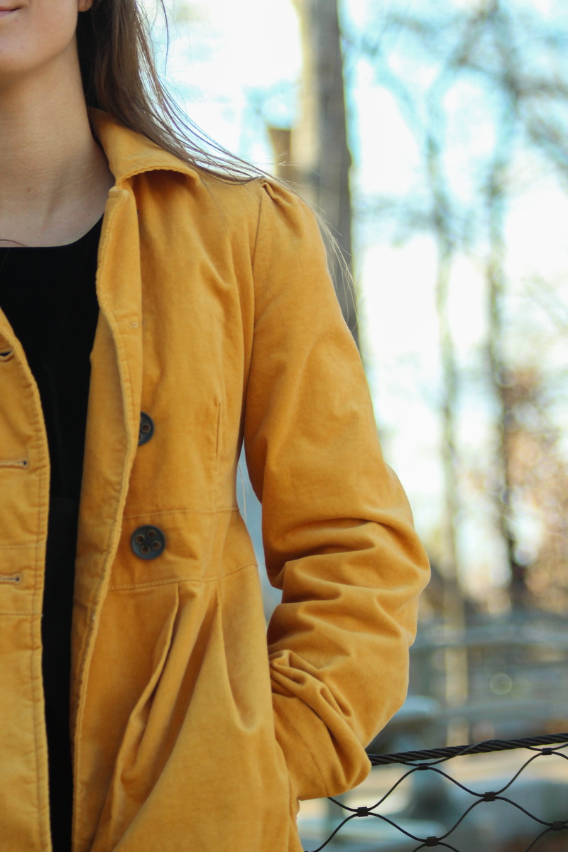 apparel, adult, fashion, long sleeve, raincoat, human, fence, front view, leather jacket, coat, khaki, lifestyles, shirt, sleeve, woman, casual clothing