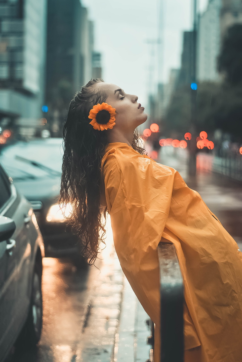hairstyle, urban area, architecture, beautiful woman, yellow, metal, photoshoot, cars, standing, built structure, 4K, city, lifestyles, street, railing