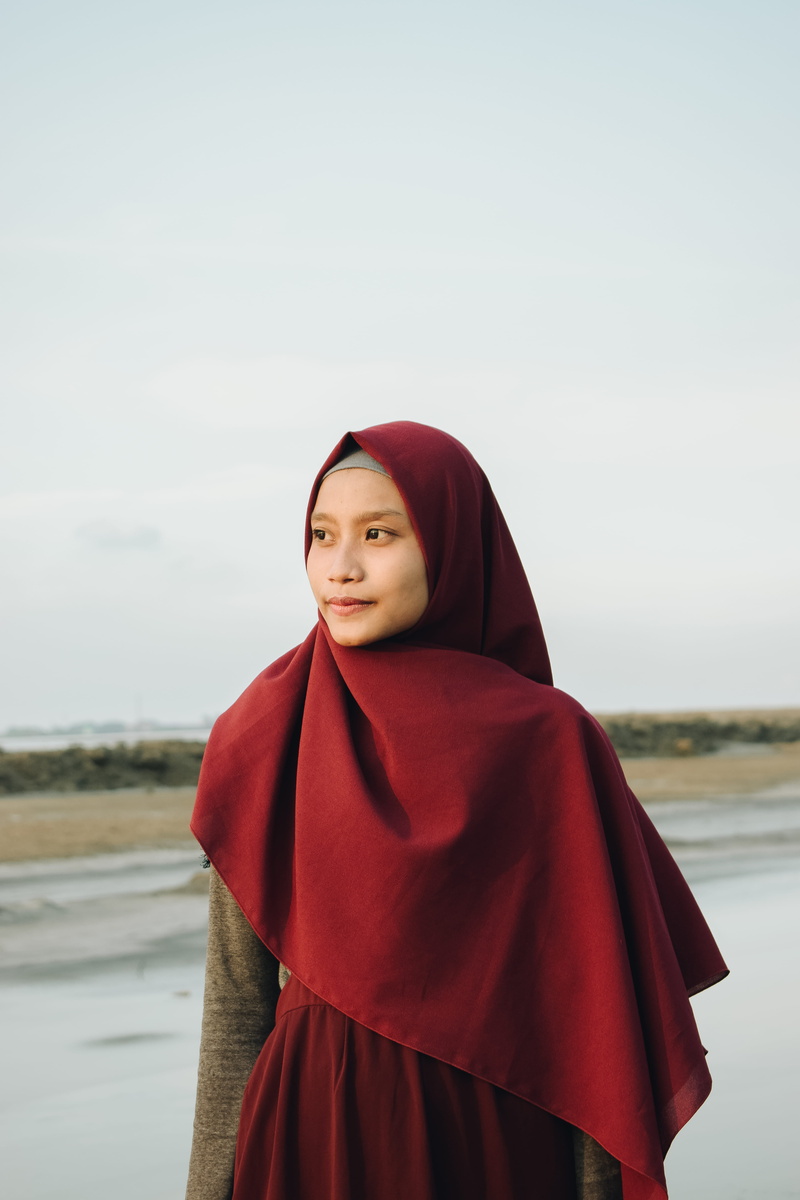 apparel, woman, cloak, hijab, ground, plant, portrait, lifestyles, sidoarjo, front view, beautifulwoman, fashion, women, outdoors, human, looking, water