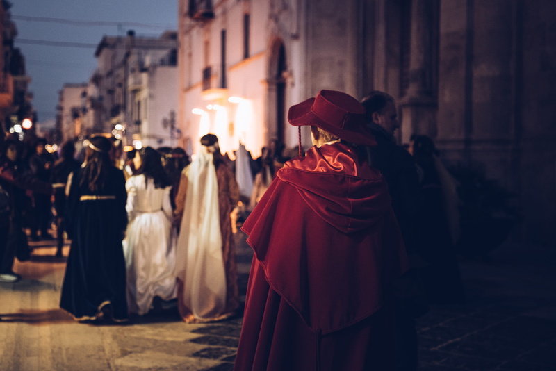 crowd, person, poncho, outdoors, festival, religion, spirituality, human, belief, adult, hat, robe, real people, road, monastery, sleeve, people, building exterior