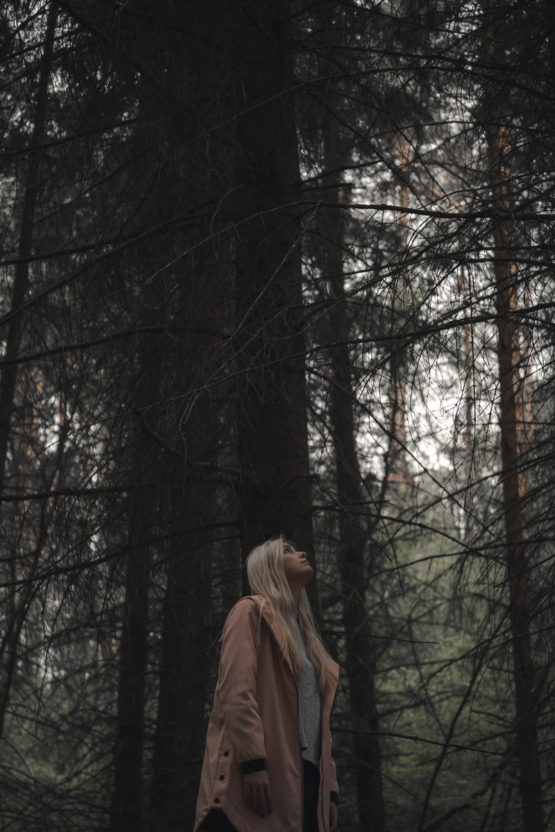 walking, leisure activity, forest, jacket, scarf, poncho, land, lifestyles, plant, adult, sweatshirt, clothing, coat, apparel, one person, sleeve, human