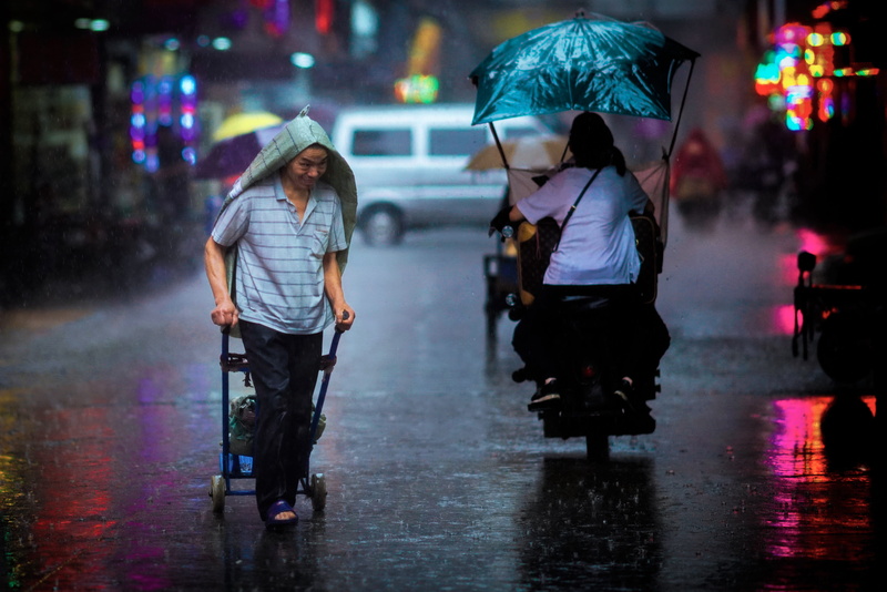 architecture, automobile, vehicle, stroller, illuminated, furniture, walking, rainy, outdoors, coat, commuters, human, 5K, tarmac, full length, asphalt
