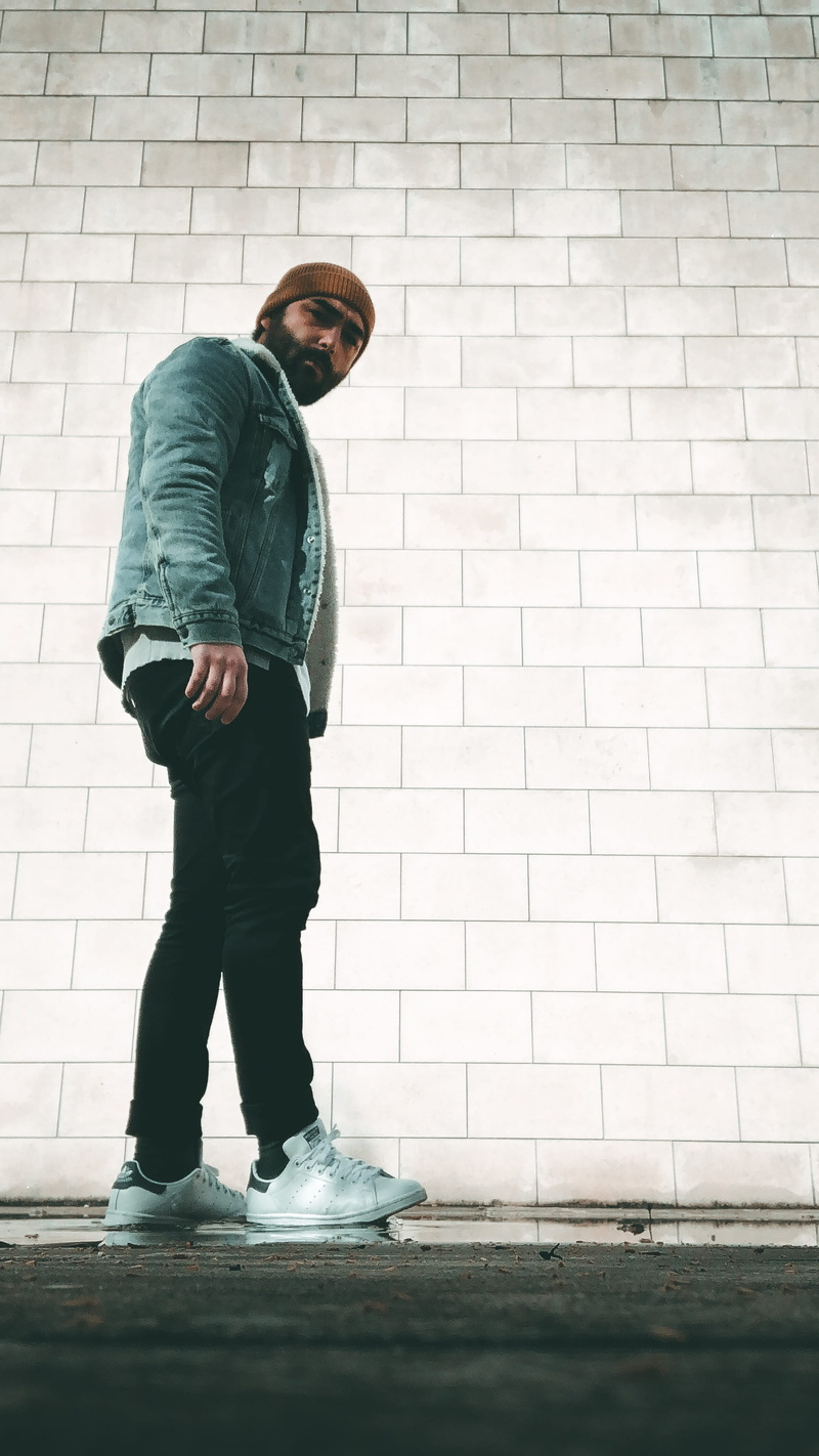 looking, contemplation, lifestyles, overcoat, suit, person, footpath, apparel, standing, casual clothing, ootd, architecture, coat, rain, levis, shoe, brick