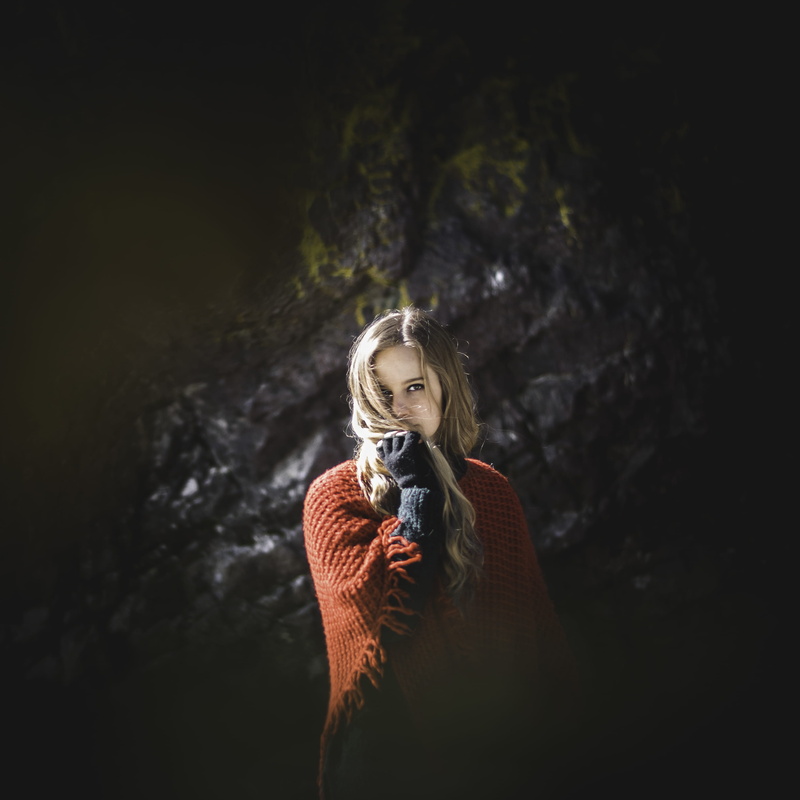 front view, flare, clothing, cape, young adult, young women, blond hair, rock, warm clothing, beautiful woman, lifestyles, plant, fashion, wearing, hair