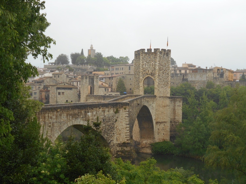 day, no people, besalu, water, arch, the past, castle, bridge - man made structure, architecture, history, trees, clear sky, travel destinations, sky, arch bridge