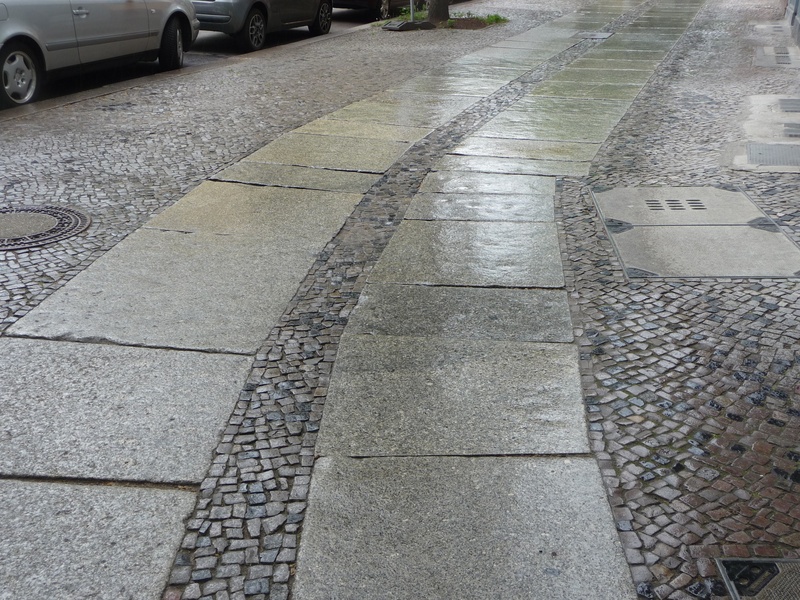 berlin patch, outdoors, high angle view, no people, road, away, concrete, stone, pretend, the way forward, paving stone, day, guide, sign, regulated, surface level