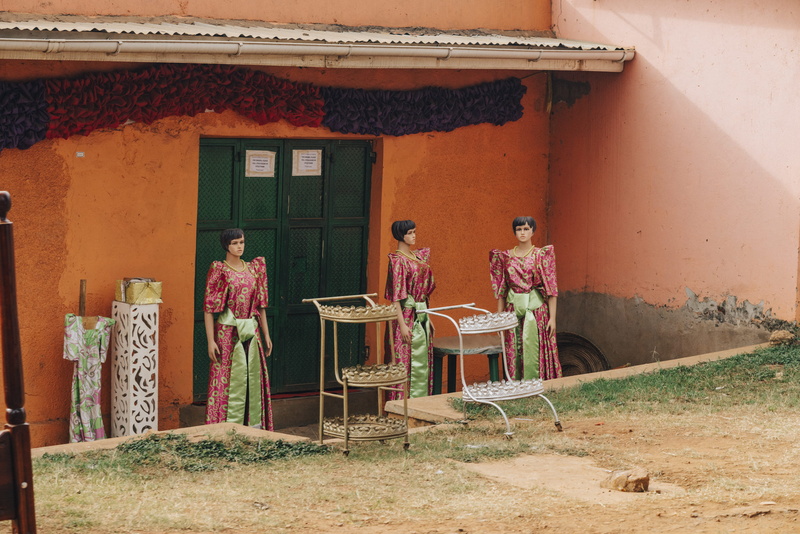 kampala, brown, soil, women, house, concrete, person, apparel, built structure, mannequin, furniture, people, architecture, rear view, africa, home decor