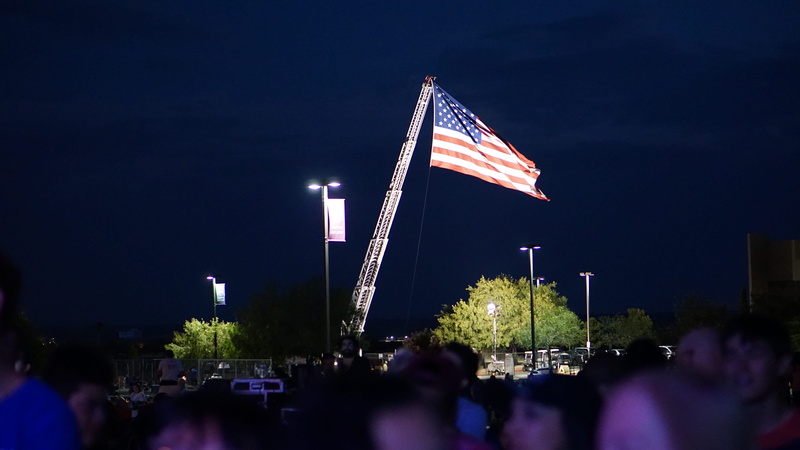 large group of people, july 4th, person, outdoors, american, fourth of july, plant, street light, girl, patriotism, people, man, city, office building exterior