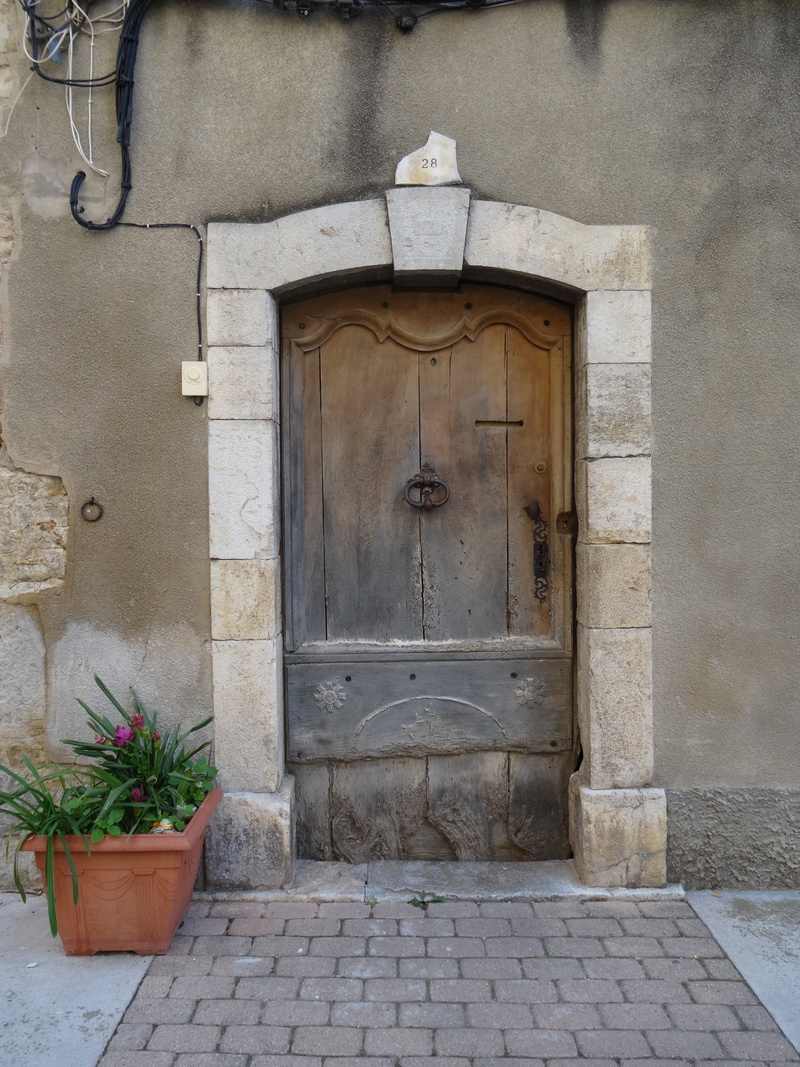 wall - building feature, plant, architecture, built structure, old, nature, wooden door, outdoors, protection, residential district, wall, scenic, footpath