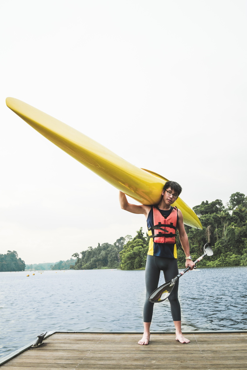 casual clothing, canoe, boy, lifejacket, water, full length, pontoon, real people, day, childhood, front view, sprint, nature, sky, outdoors, leisure activity