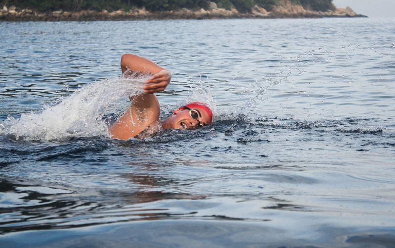 swimming, childhood, males, leisure activity, mouth open, beach, teen, human, motion, sport, apparel, outdoors, lifejacket, headshot, swimwear, one person
