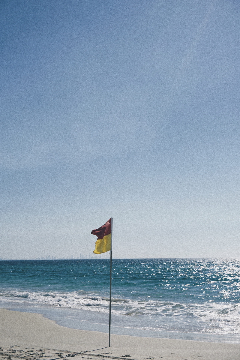 day, promontory, emblem, sea, sky, symbol, nature, no people, water, lifejacket, soil, horizon over water, leisure activities, american flag, tranquil scene
