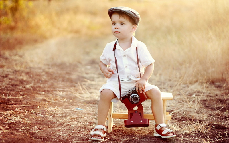 people, clothing, human Face, day, collared, offspring, happiness, smiling, activity, action, playing, joy, retro Styled, front view, child, small, camera