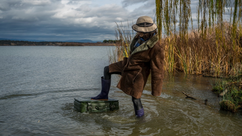 river, drowns, grass, 4K, swimming, feet, the situation, pond, girl, nature, rubber boots, is, pose, coat, suitcase, clouds, hat, autumn