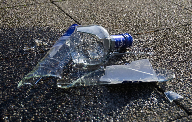 plastic bag, outdoors, land, bottle, road, no people, sunlight, close-up, nature, city, 4K, glass, single object, plastic, high angle view, day, asphalt