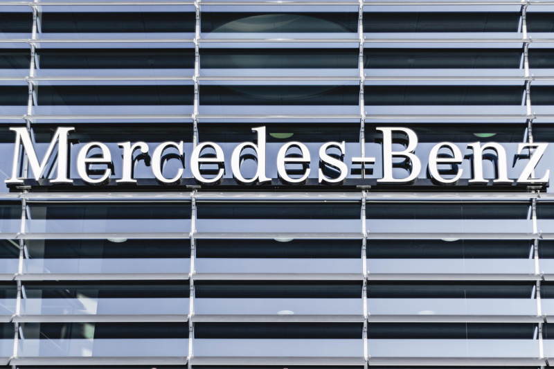 trademark, building, curtain, mercedes benz, capital letter, glass - material, home decor, outdoors, building exterior, emblem, communication, sign, garage