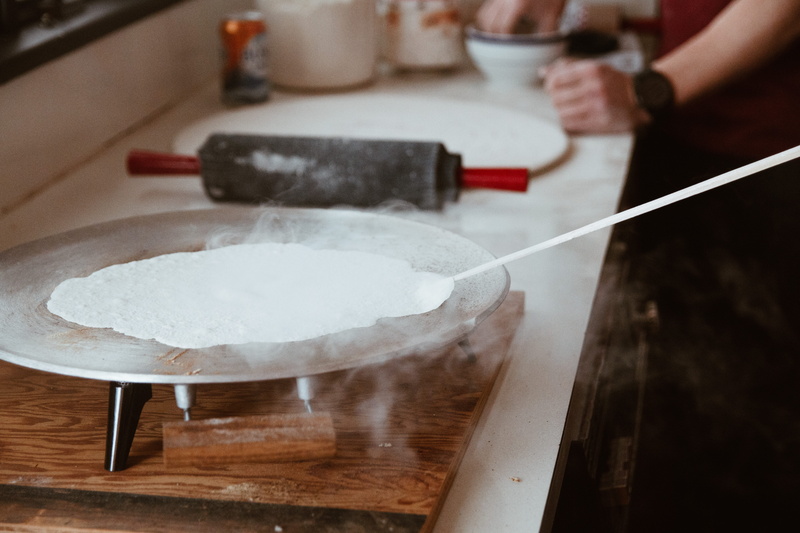 chef, seasoning, gray, minnesota, making lefse, wood, mixing bowl, occupation, human, pad, body part, finger, preparation, bowl, white, plant, sweets, food and drink