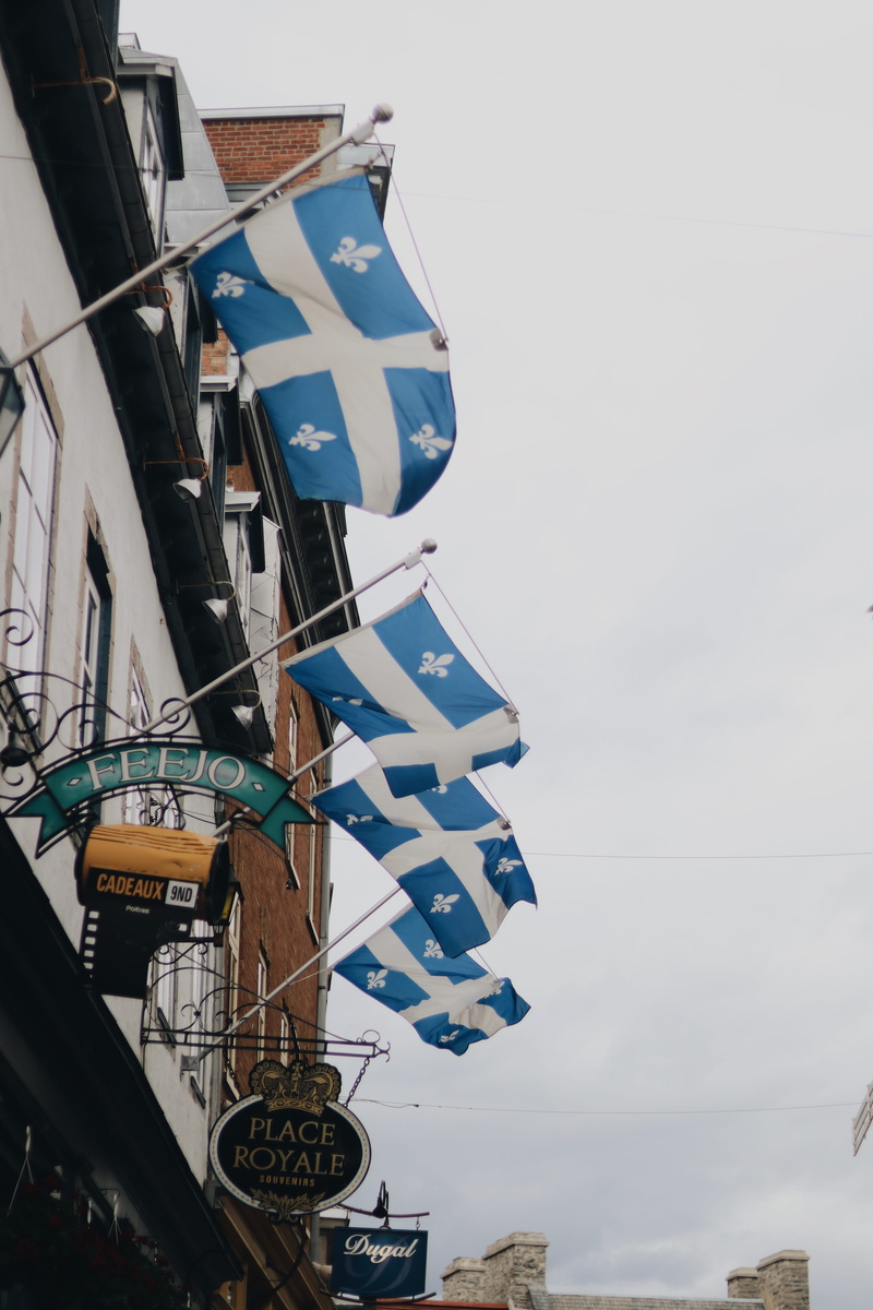 street, architecture, built structure, canopy, building exterior, alley, nautical vessel, awning, sky, high rise, urban, nature, transportation, leisure activities