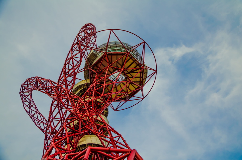 coil, outdoors, tower, steel, connection, low angle view, structure, design, metal, landmark, tall - high, building, amusement park, communication, theme park