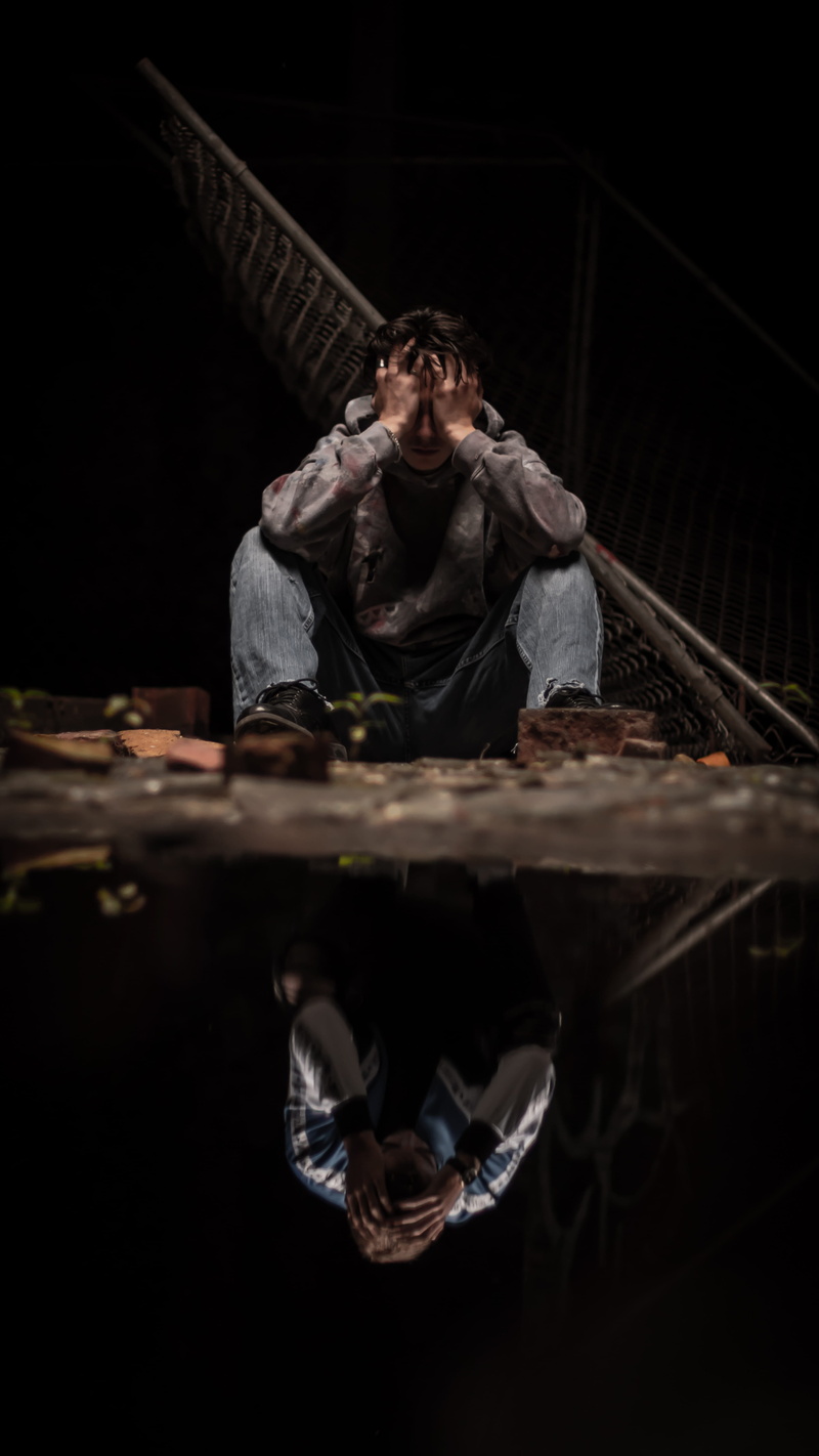 human, young men, wood, nighttime, finger, overcoat, adult, urban, depression - sadness, pants, men, night, plywood, man, young adult, looking up, studio shot