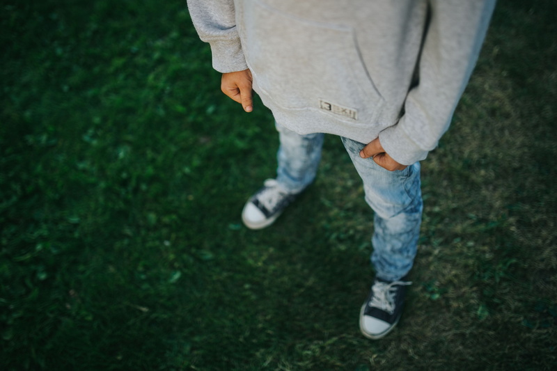 body part, outdoors, low section, focus on foreground, lifestyles, 4K, one person, casual clothing, garden, plant, human leg, caucasian Ethnicity, in the garden