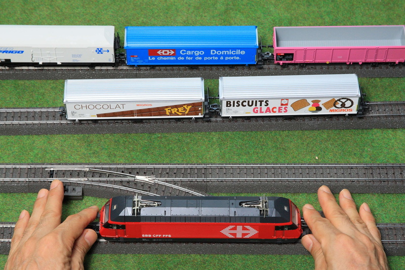 personal perspective, cargo containers, human finger, one person, train, arts culture and entertainment, hand, hands, railway, transportation, engineering