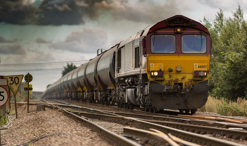 no people, railtrack, train - vehicle, stones, public transportation, rocks, rail transportation, railroad car, train, locomotive, track, railroad track