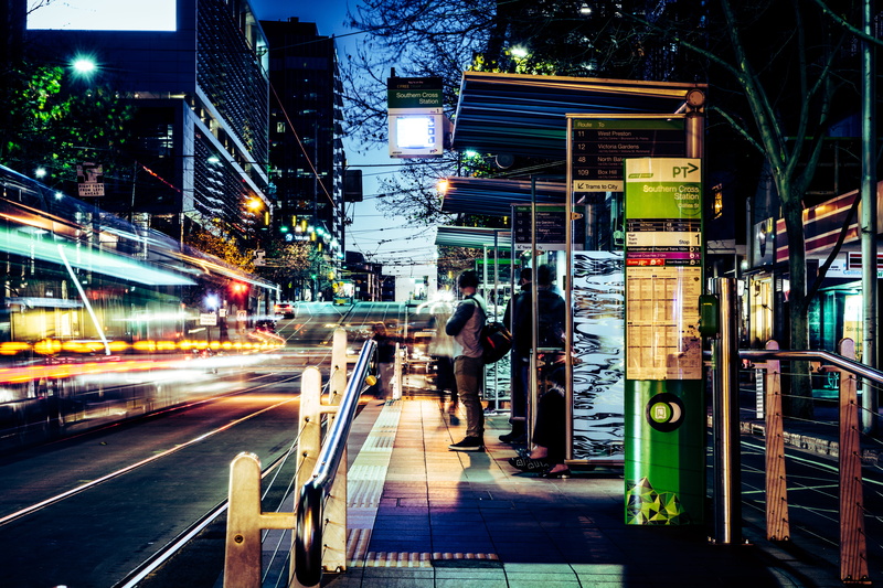 city life, street, commuting, speed, long exposure, road, southern cross tram stop, australia, architecture, light, city street, sign, people, city, light trail