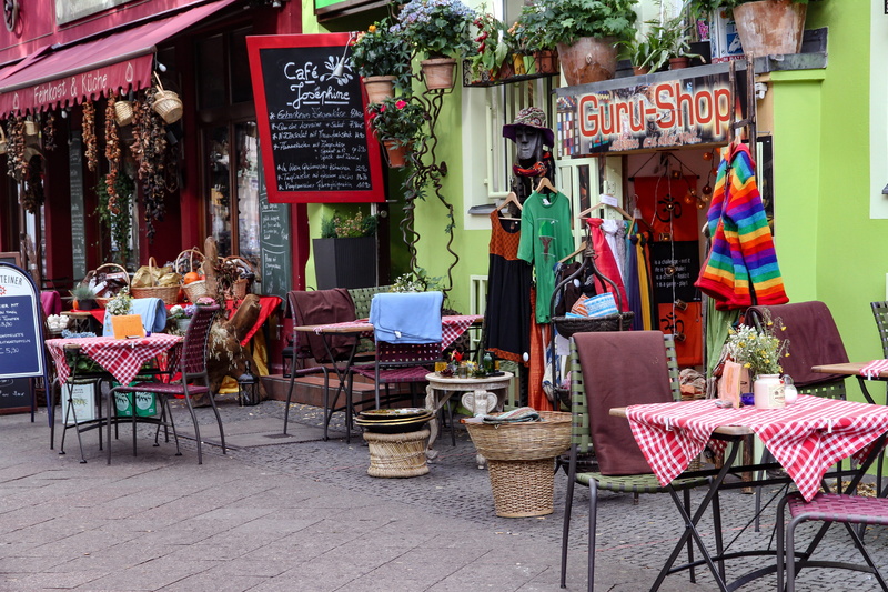building, business, kreuzberg, table, 5K, communication, text, no people, retail, cafe, retail display, market, western script, outdoors, restaurant, seat