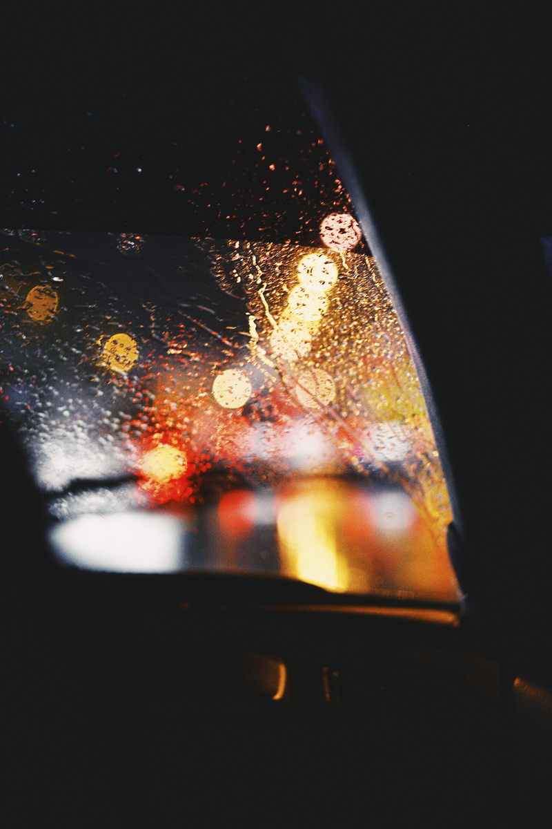 motor vehicle, glass, streetscape, bokeh, no people, indoors, nature, streetphotography, waterdrop, lights, wet, drink, rain, car light, transparent, rainy season
