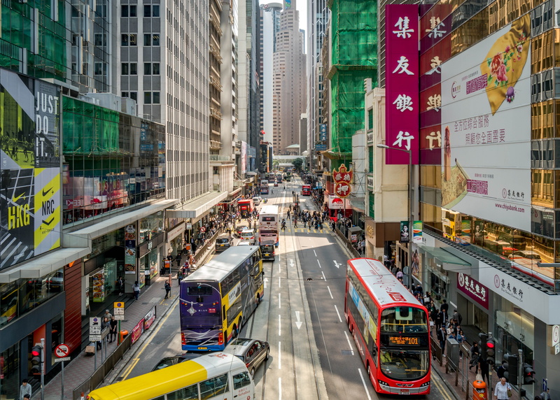 buses, traffic, built structure, commuter, mode of transportation, motor vehicle, architecture, street, cityscape, vehicle, city, outdoors, office building exterior