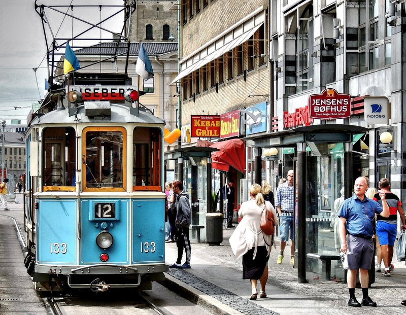 city Life, built structure, real people, tram, old tram, adult, lifestyles, outdoors, street, group of people, building exterior, shopping street, cable Car