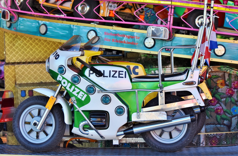hustle and bustle, day, no people, police motorcycle, ride, children motorcycle, fairground, carousel horse, children, stationary, fair, wasen, multi colored